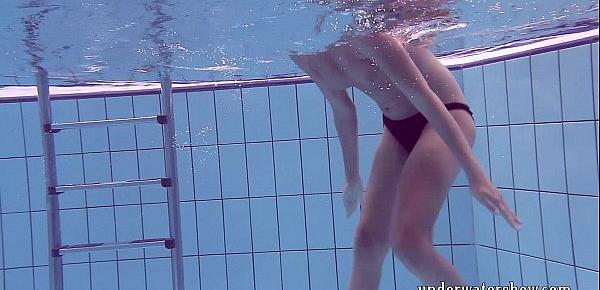  Lucy takes off bikini in the pool